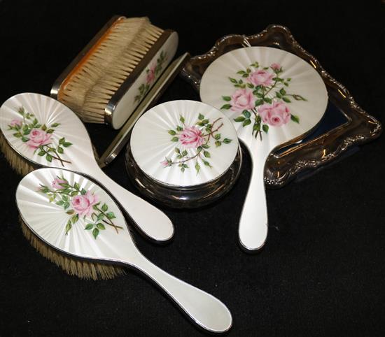 Silver & white guilloche enamel-mounted dressing table set, decorated rose sprays (8) & a silver-mounted shaped photograph frame